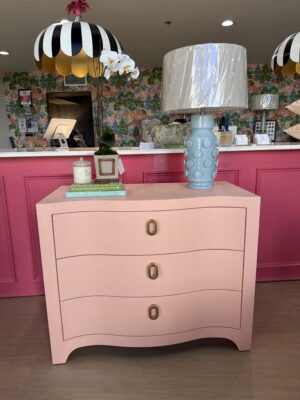 Curved  3 drawer chest with gold hardware pink linen wrapped