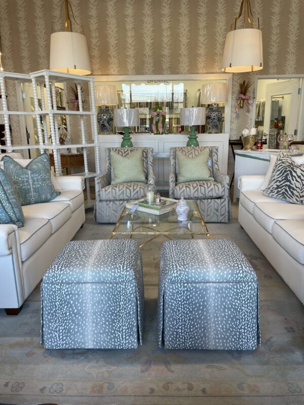 SET of rolling blue antelope skirted ottomans