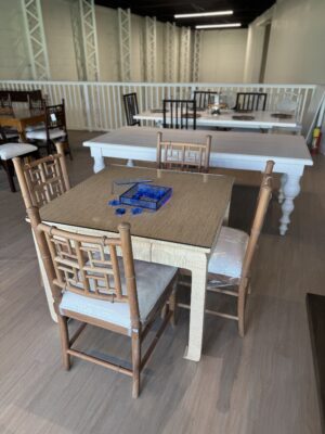 Natural grass cloth mingfoot game table with drawers and glass top