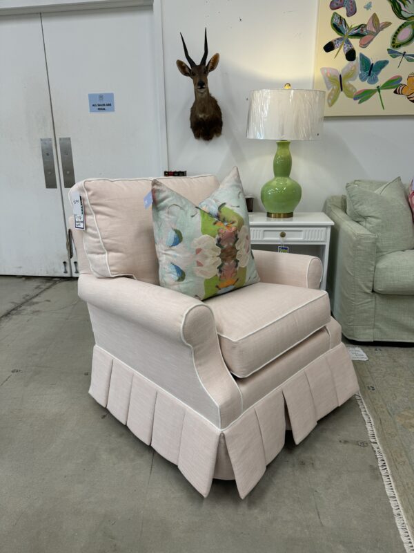 Single pink swivel rock, pleaded skirt chair, covered in inside out, pink performance fabric with a white welt!  Would be amazing in a nursery! - Image 4