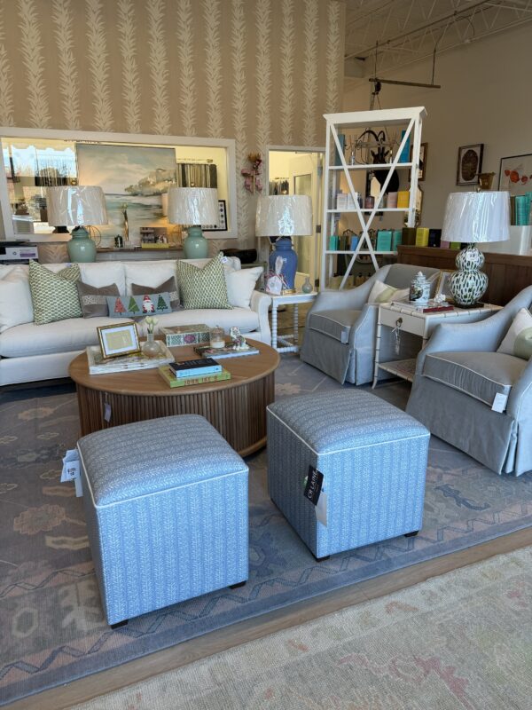 Set of cube ottoman, stools in blue leaf fabric with white welt and walnut leg $1200 each