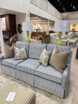 Wesley Hall three over three sofa covered in Siamese turquoise with the reverse side welting!