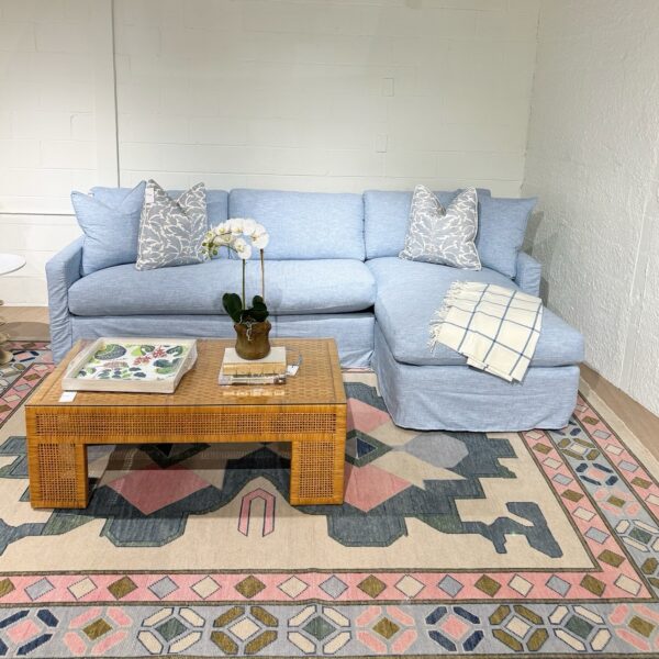 Blue slipcovered sofa with a chase lounge covered in performance fabric with down blend cushion fill - Image 9