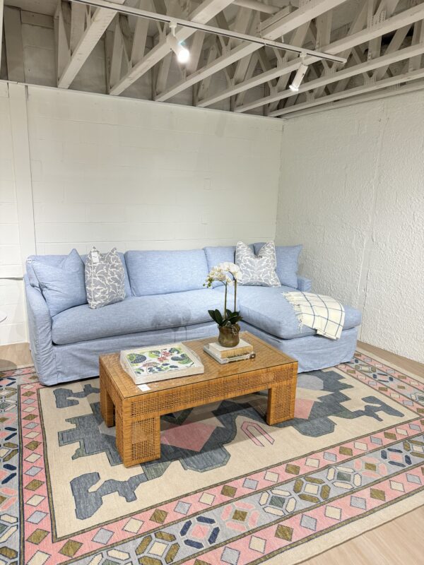 Blue slipcovered sofa with a chase lounge covered in performance fabric with down blend cushion fill - Image 4