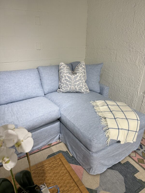 Blue slipcovered sofa with a chase lounge covered in performance fabric with down blend cushion fill - Image 7