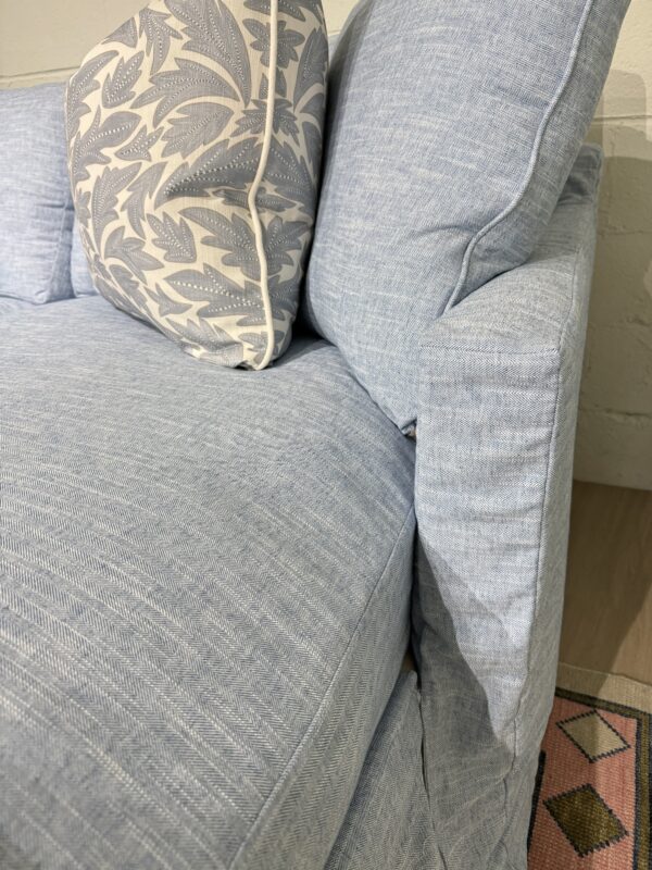 Blue slipcovered sofa with a chase lounge covered in performance fabric with down blend cushion fill - Image 6