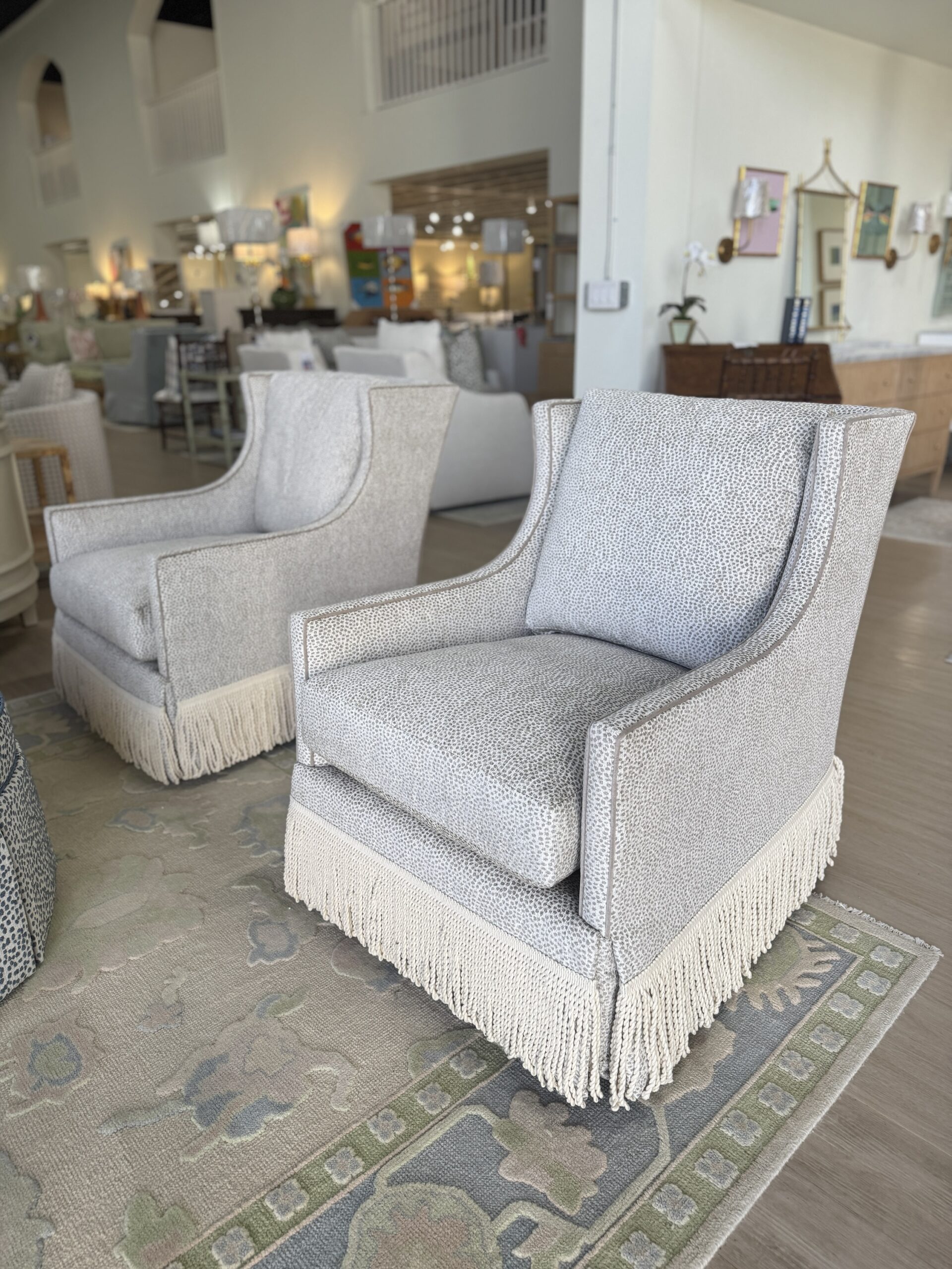 Grier skirted chair in fabric yambo platinum with a toupe welt & fringe tape trim - these swivel and rock chair ! - 2950 each - sold as a set! - Image 3