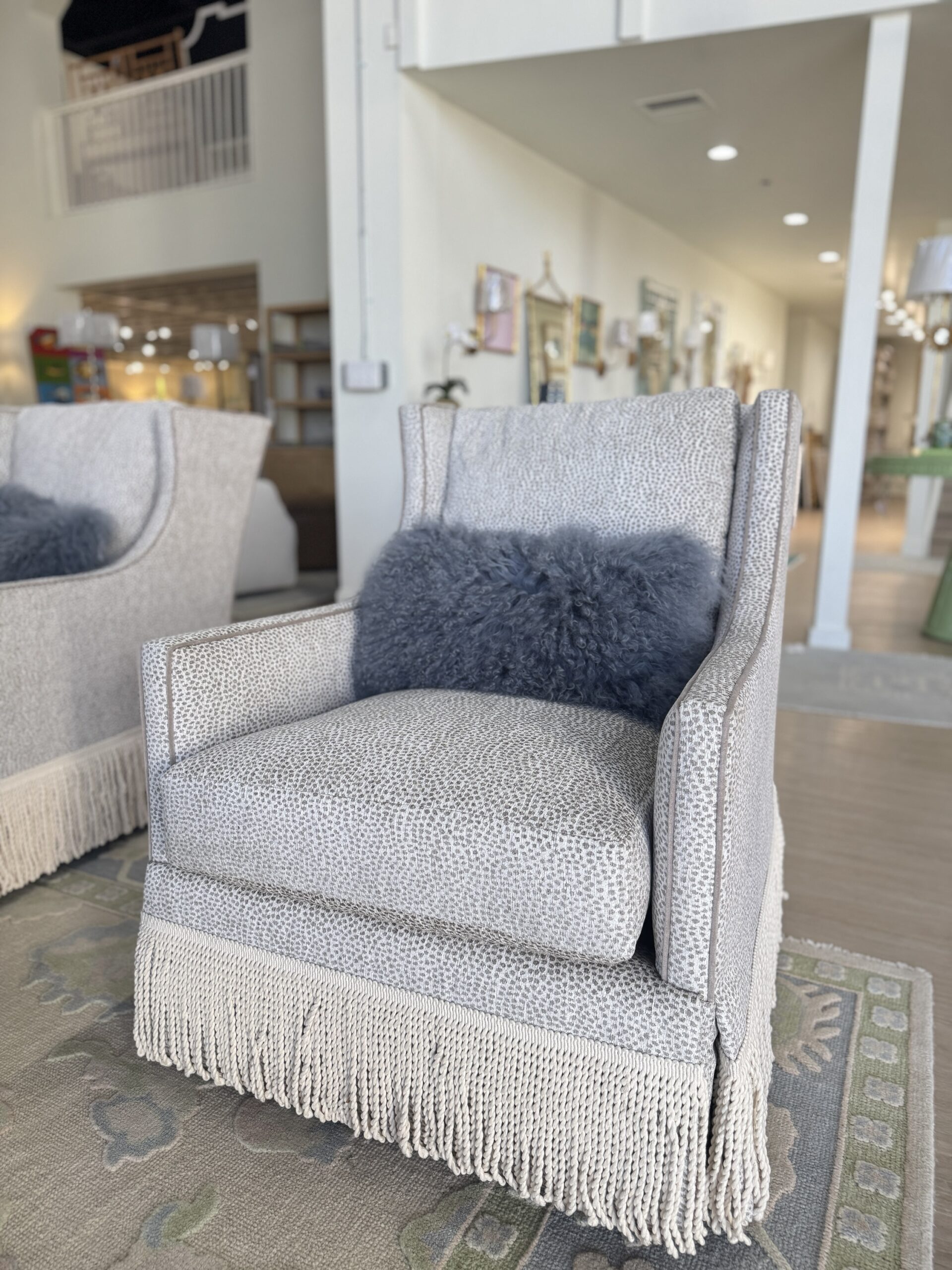 Grier skirted chair in fabric yambo platinum with a toupe welt & fringe tape trim - these swivel and rock chair ! - 2950 each - sold as a set!