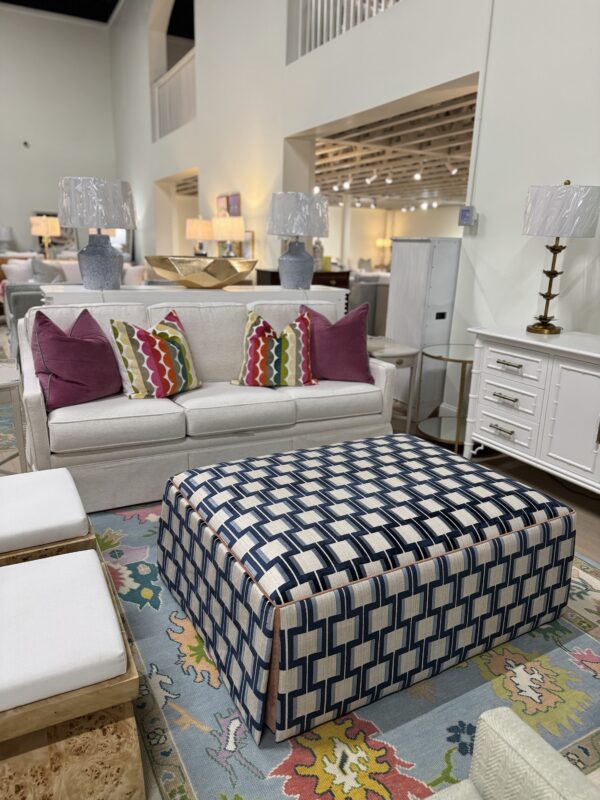 Lilly large rectangular skirted ottoman in Ocelot blue with a light orange under skirt and welding - Image 6