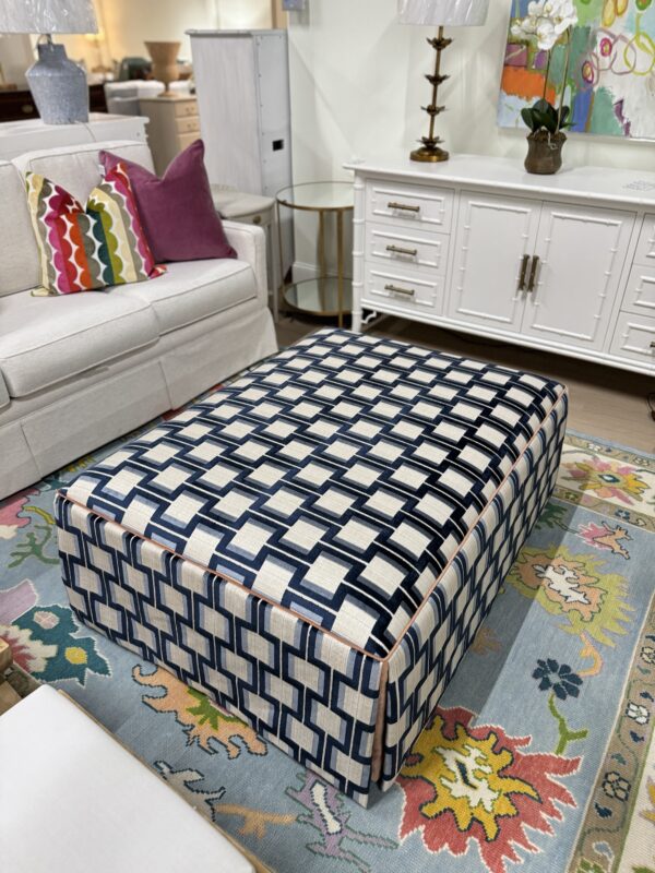 Lilly large rectangular skirted ottoman in Ocelot blue with a light orange under skirt and welding - Image 2