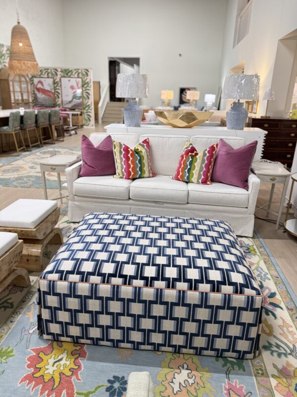 Lilly large rectangular skirted ottoman in Ocelot blue with a light orange under skirt and welding - Image 4