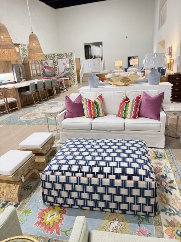 Lilly large rectangular skirted ottoman in Ocelot blue with a light orange under skirt and welding - Image 5