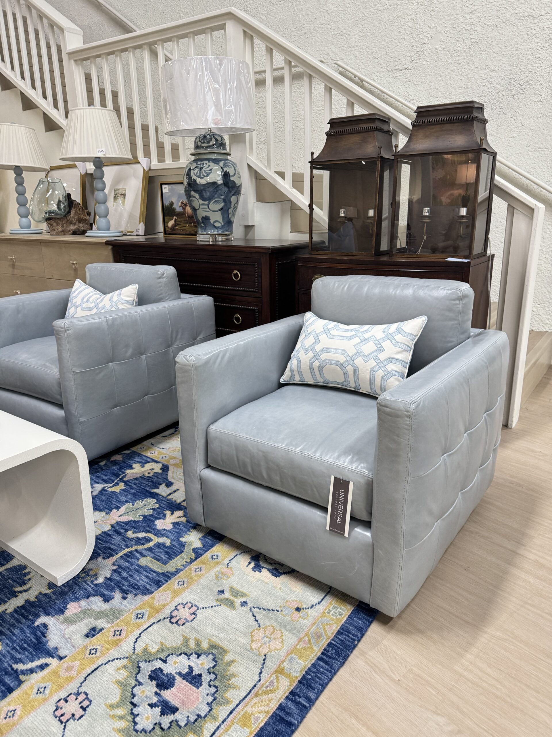 Universal furniture. Adley baby blue genuine leather swivel chairs