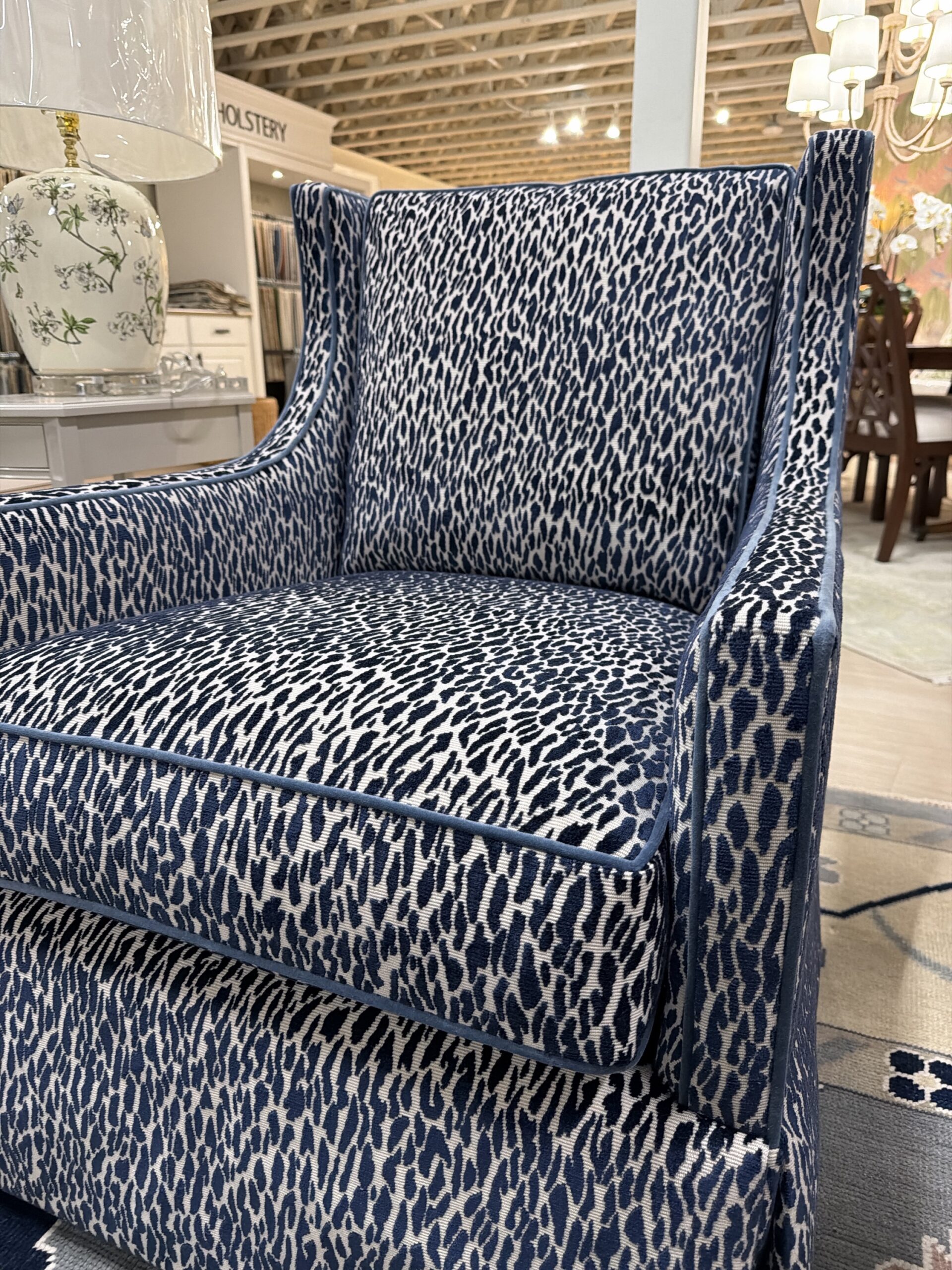 Grier skirted swivel and rock chair set covered in fleck midnight with a blue welt ! - $2750 each! - Image 4