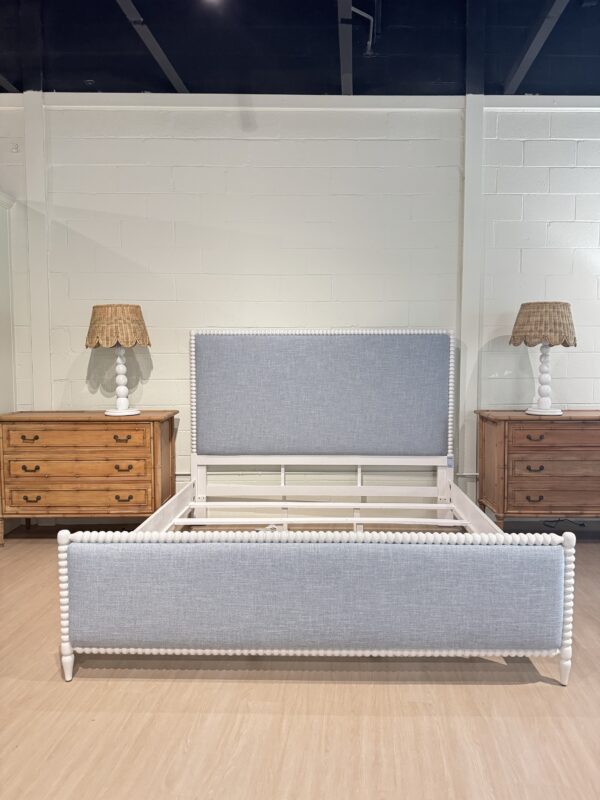 King spool bed in a white wooden finish with blue upholstered fabric, headboard, and footboard - Image 7