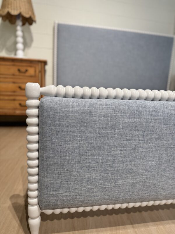 King spool bed in a white wooden finish with blue upholstered fabric, headboard, and footboard - Image 2