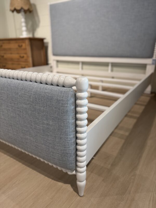 King spool bed in a white wooden finish with blue upholstered fabric, headboard, and footboard - Image 5