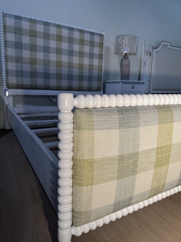 Queen spool bed in a white wooden finish with green blue and neutral gingham upholstered fabric, headboard, and footboard - Image 4