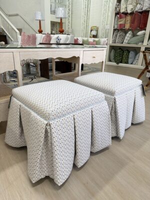 Set of kick pleat cube skirted Ottomans with a blue velvet welting!