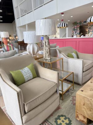 Set of swivel barrel chairs￼ covered in Yambo platinum with a performance interior banks oatmeal and brass nail heads! $2300 each