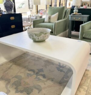 Kai white grass cloth curved cocktail table