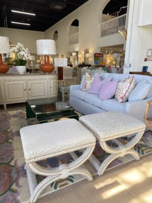 Set of Ottomans with golden nail heads and silver leopard pattern fabric