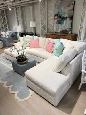Brickel sectional set covered in a neutral fabric! Cleaning code S