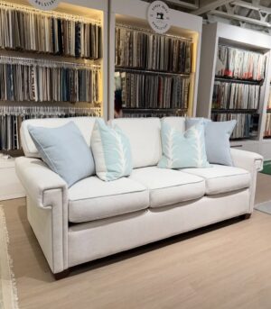 Cameron Greek key sofa covered in performance fabric krypton nomad snow with performance welt nomad Oxford