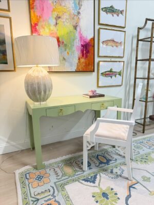 green spring console desk with two drawers for storage