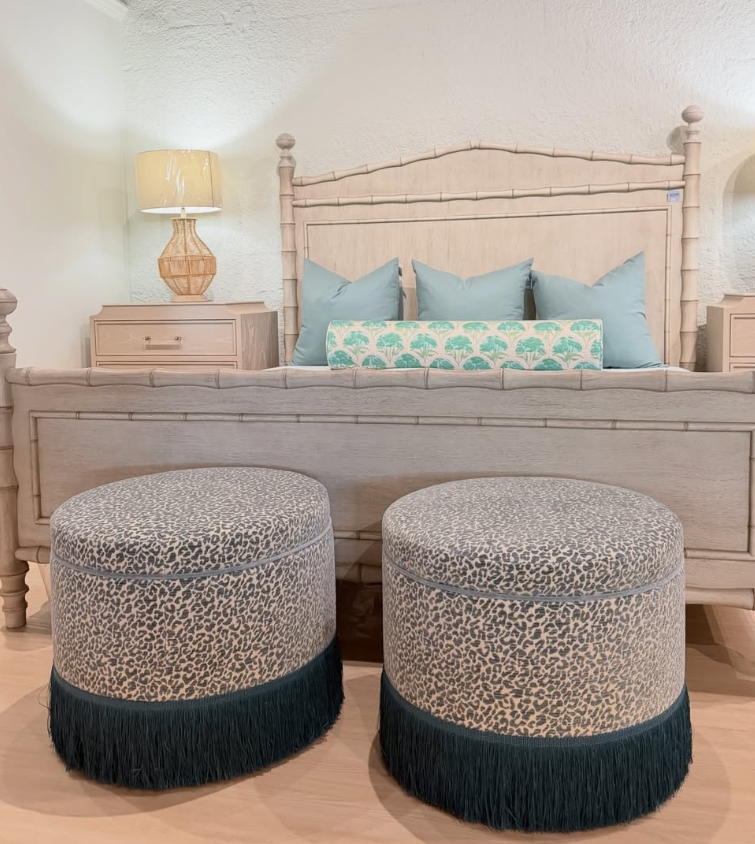Swivel Bub ottoman set covered in dotty sea with blue fringe