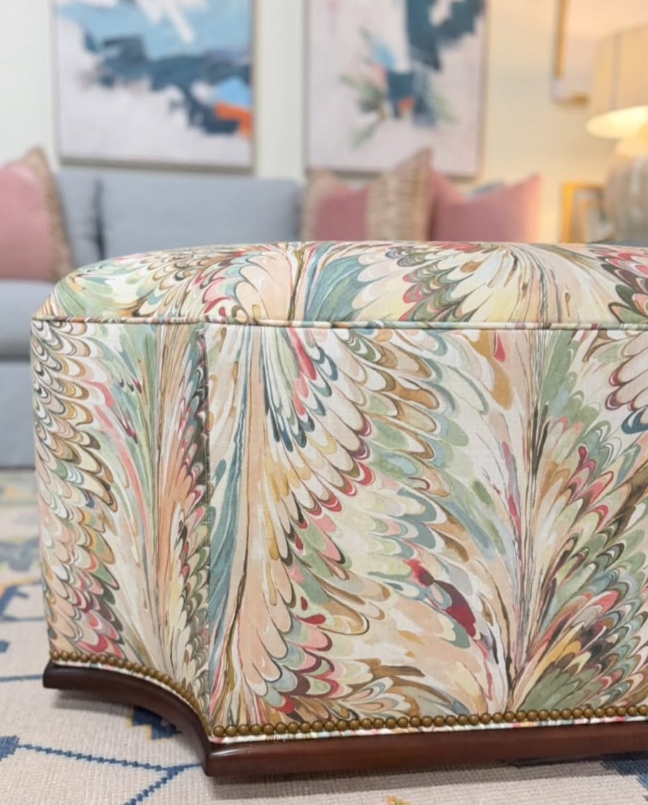Furrow ottoman covered in aray multi with a wooden base and gold nail heads - Image 3