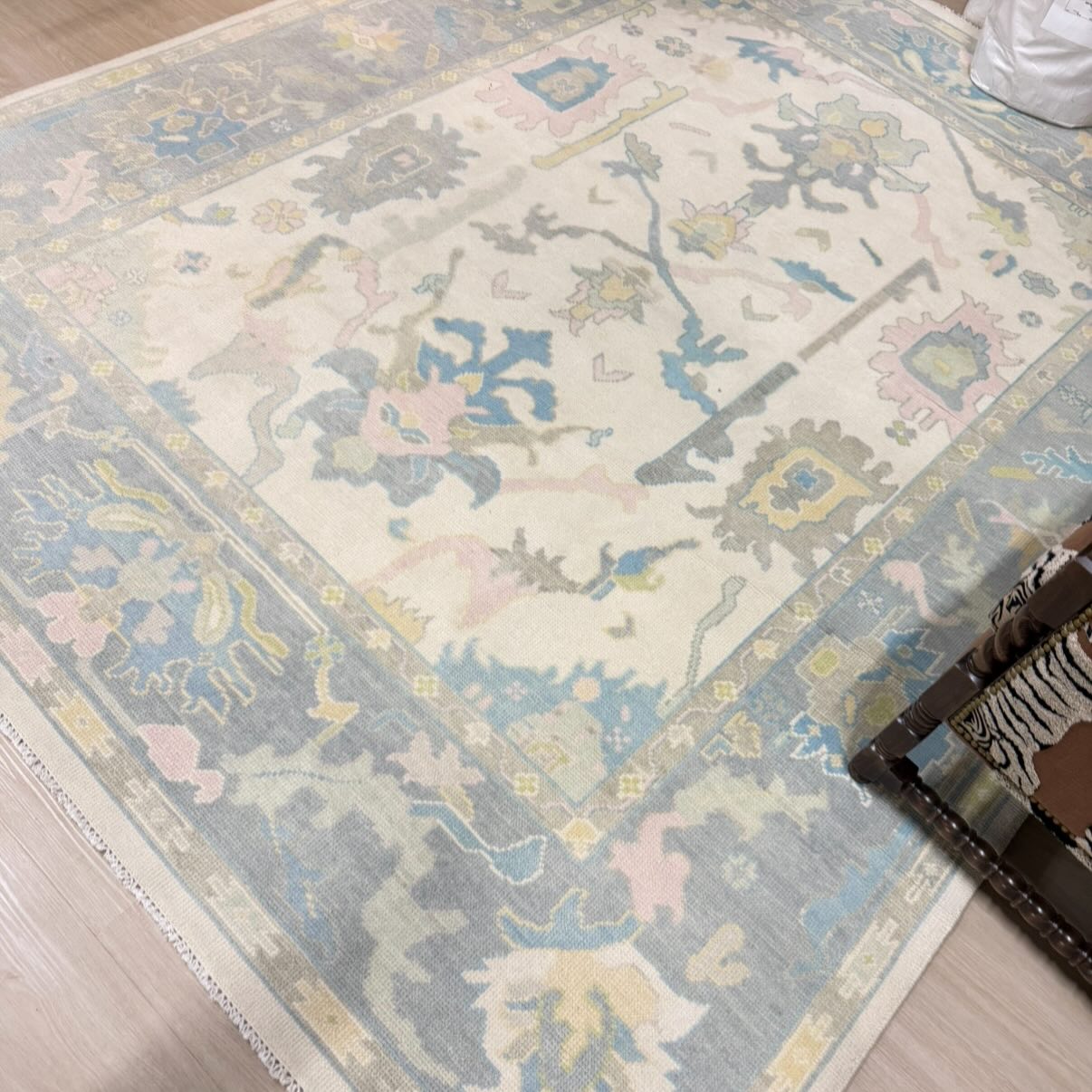 8x10 muted toned Turkish oushack rug