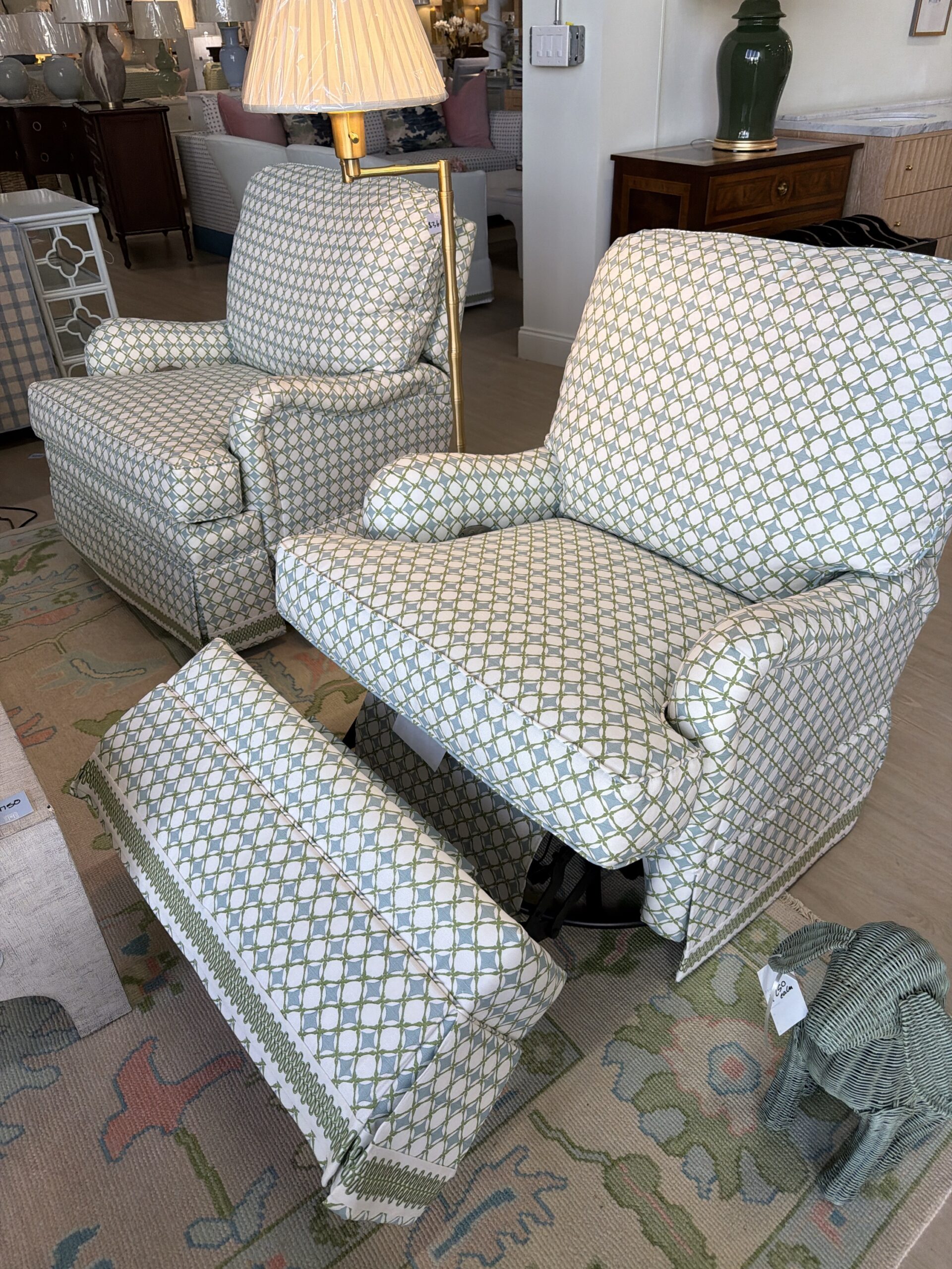 Electric swivel rock and recline covered in green blue diamond team with green trim $3600 each