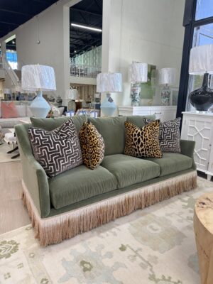 Darius sofa covered in green velvet Heather Moss with ombre camel bullion