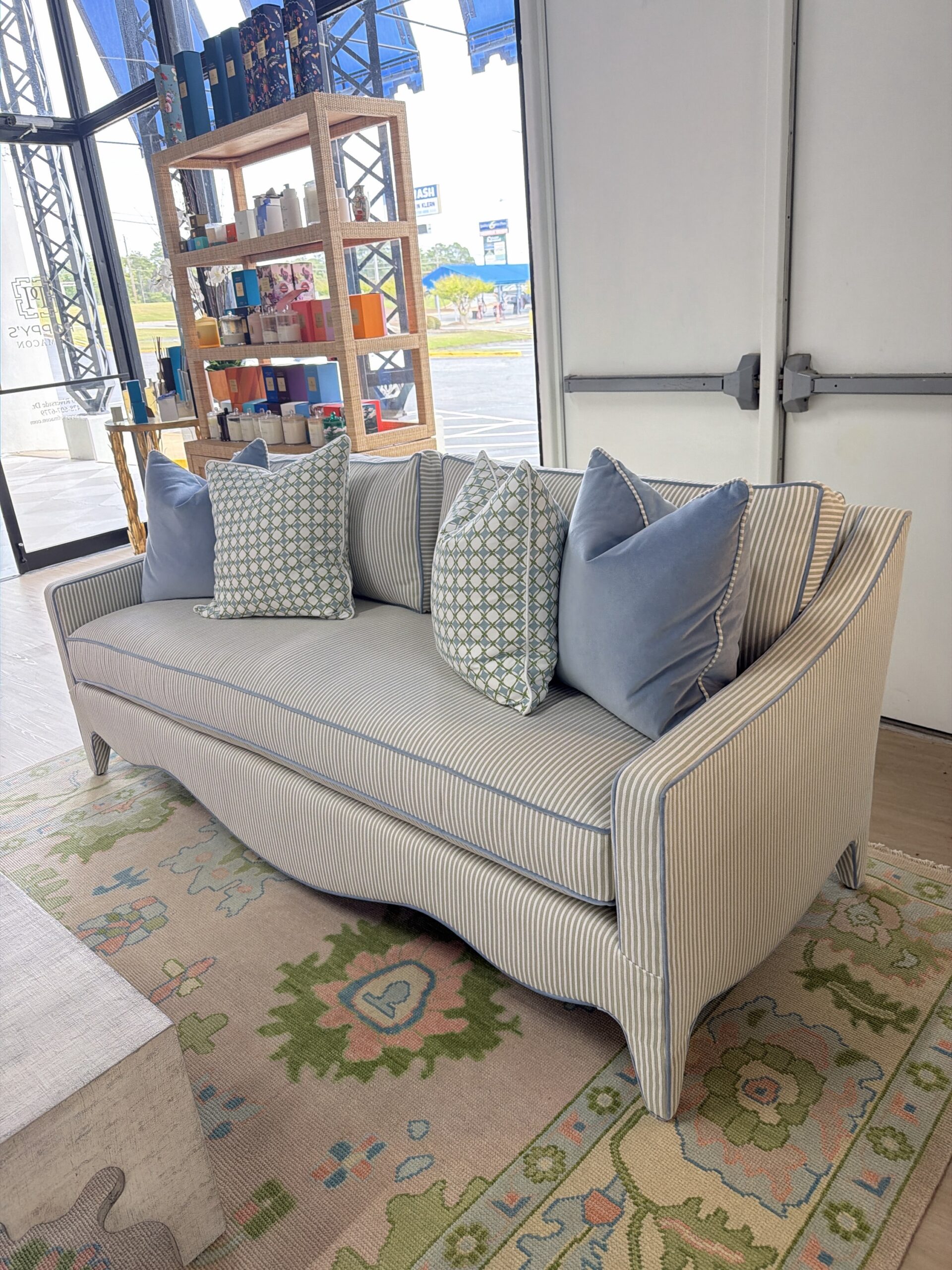 Mila sofa covered in performance fabric sunbrella fern with blue welt - Image 4