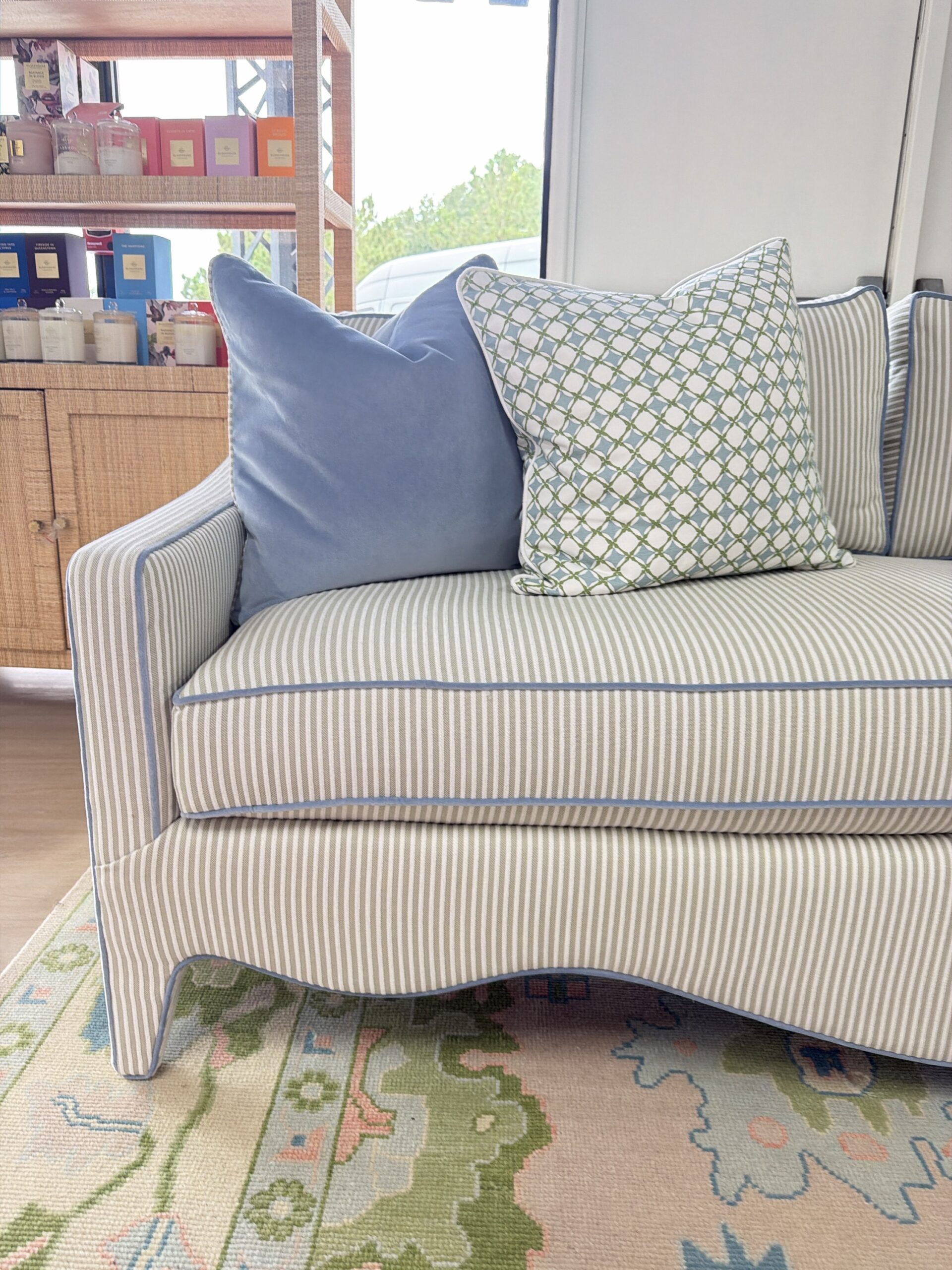 Mila sofa covered in performance fabric sunbrella fern with blue welt - Image 5