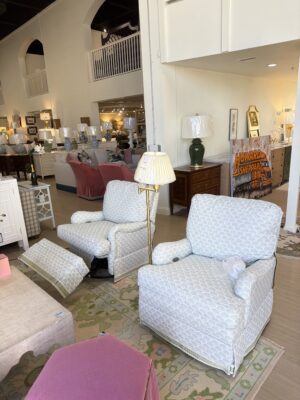 Electric swivel rock and recliner covered in blue palm with green tape trim  $3600 each - sold as a set-