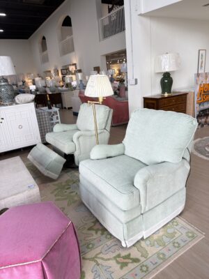 Electric swivel rock and recliners covered in green jamboree with white trim $3600 each - sold as a set