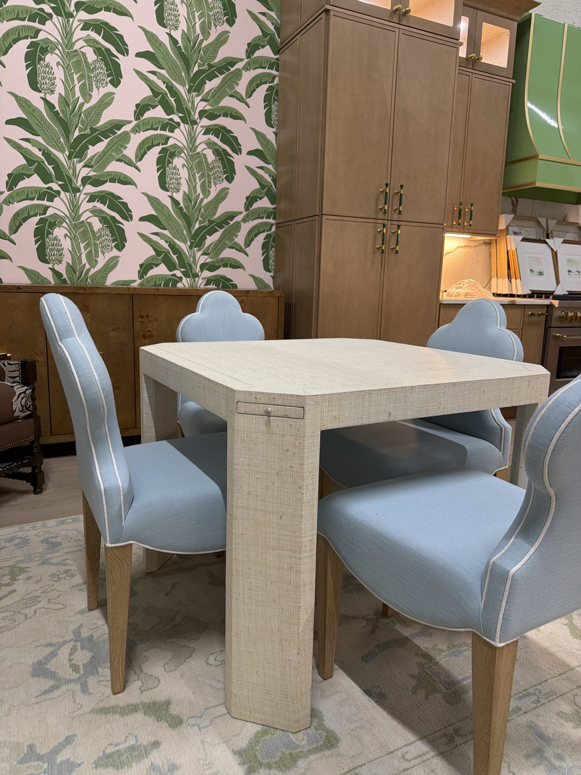 Pax game table table in a natural rattan grass cloth finish