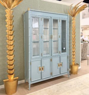 Vintage lacquered China cabinet Stanley aloha with Thibaut wallpaper in the back lacquered in blue
